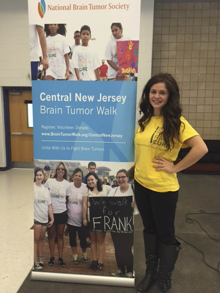 Young survivor of brain tumor calls on volunteers