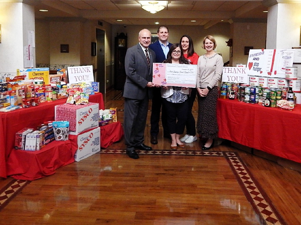 Reformed Church Home makes donation to Old Bridge Food Bank