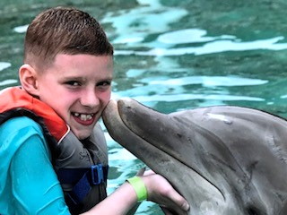 Make-A-Wish grants young Old Bridge boy’s wish to swim with the dolphins