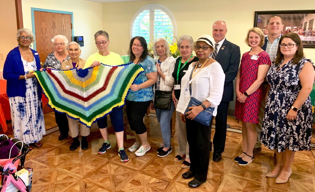 Silver Linings at Old Bridge presents shawls to residents of Reformed Church Home