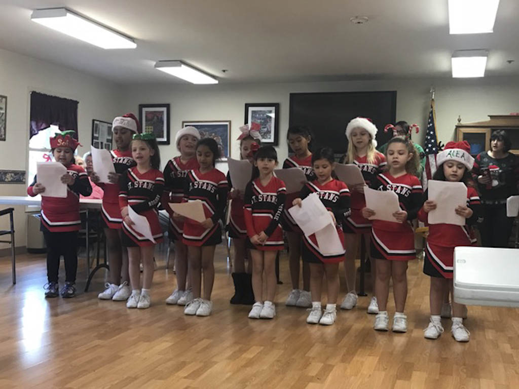 Youngsters bring ‘cheer’ to seniors at Gillette Manor