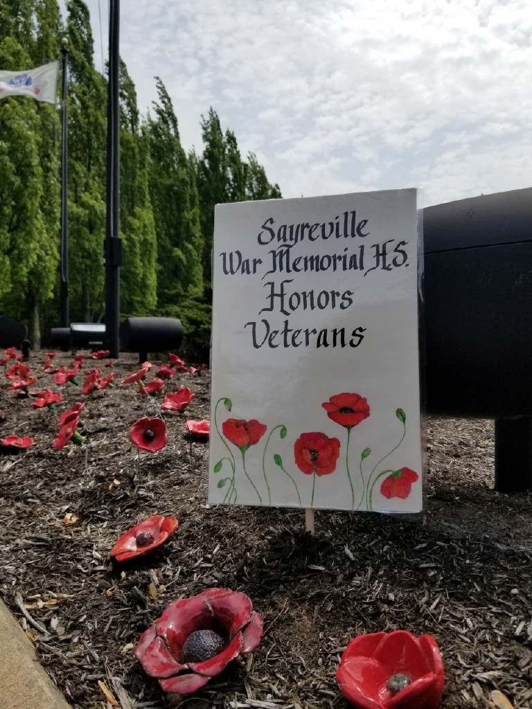 Sayreville War Memorial students create ceramic poppies for Vietnam Veterans memorial