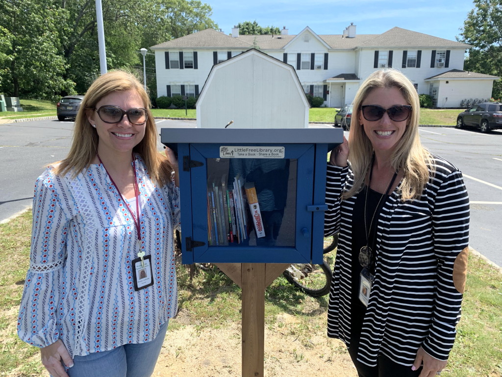 Little free libraries placed at apartment complex and park in Howell